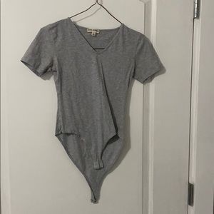 grey bodysuit